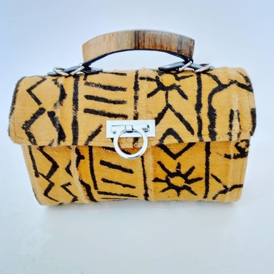 Bags in black and white and yellow and black with wood finish