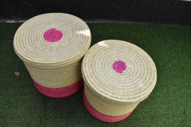  Baskets with lids standing on green bottom 